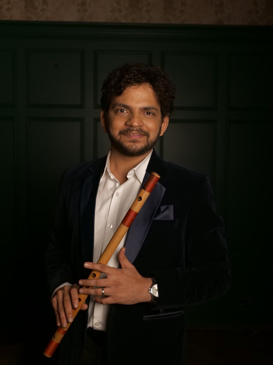 Avadhoot Phadke holding a bansuri
